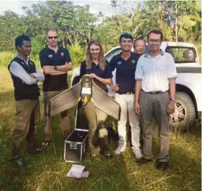  ??  ?? Dr Timothy William (right) with the team members who were involved in the first health research project in the world using drones.