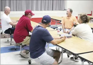  ?? Brodie Johnson • Times-Herald ?? Members of the Palestine-Wheatley School Board met in a brief special session Thursday evening to approve moving bleachers from the current football field to the new one on the high school campus. Board members approved paying over $35,000 to move the bleachers.