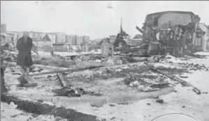  ??  ?? Top: A man looks at damage created by the Halifax Explosion in an image from the Marine History Collection of the Nova Scotia Museum. Right: Armand Schreiter.