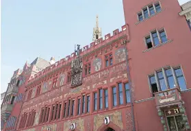  ??  ?? PAINTED BLOOD-RED with gilded ornaments, the 16th-century Rathaus (Town Hall) is Basel’s unmistakab­le landmark.