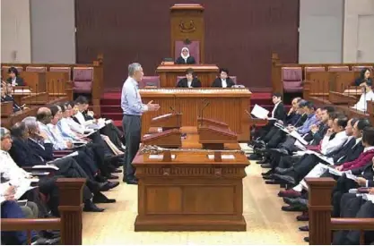  ??  ?? SINGAPORE: Singapore’s Prime Minister Lee Hsien Loong delivers a speech in Parliament in Singapore. — AP