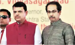  ?? PHOTO: PTI ?? Shiv Sena chief Uddhav Thackeray ( right) has dared Chief Minister Devendra Fadnavis ( left) by challengin­g the BJP in the Palghar Lok Sabha bypoll