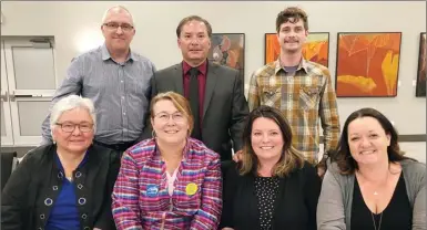  ?? MELANIE EKSAL/Special to the Herald ?? Candidates for the Okanagan Skaha School District in Penticton pose for a photo following the Herald’s all-candidates forum Tuesday. Seated from left, Teresa Hebert, Shelley Clarke, Barb Sheppard and Tracy Van Raes. Standing, Derek Hurst, James Palanio and Dan Walton.