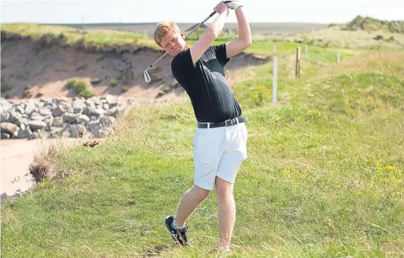  ??  ?? A game under threat: Sean Logue in action on the second tee at Montrose, with the erosion clear in the background.