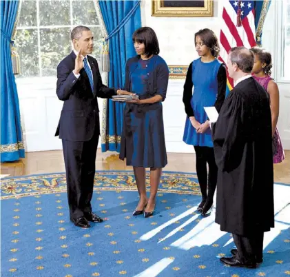  ?? /AP ?? “Lo hice”. Eso dijo Obama a una de sus hijas, tras jurar ayer en La Casa Blanca, sobre una Biblia familiar.