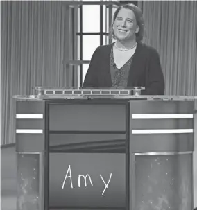  ?? PRODUCTION­S INC. JEOPARDY ?? Champion Amy Schneider on the set of “Jeopardy!” Schneider is the first trans person to qualify for the show’s Tournament of Champions.