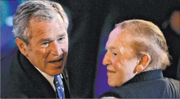  ?? Sebastian Scheiner The Associated Press file ?? President George W. Bush sits next to Sheldon Adelson in Jerusalem in 2008. Bush was visiting Israel on the occasion of the 60th anniversar­y of the founding of the state. “He will be missed by many, none more than his beloved family,” Bush said.