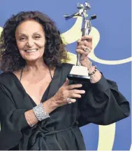  ?? [PHOTO BY EVAN AGOSTINI, INVISION/AP] ?? Diane von Furstenber­g, winner of the positive change award, poses Monday in the winner’s walk at the CFDA Fashion Awards at the Brooklyn Museum in New York.