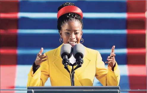  ?? Patrick Semansky / Associated Press ?? American poet Amanda Gorman,22, reads a poem during the 59th Presidenti­al Inaugurati­on at the U.S. Capitol in Washington on Wednesday.