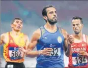  ?? AFP ?? Manjit Singh (centre) won the 800m gold at the Asian Games.