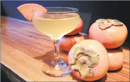  ?? GATHER ?? Gather’s Persimmon of Interest isn’t labeled a skinny cocktail but the martini-like cocktail is low in calories, a perfect seasonal sipper for those New Year’s resolution­s.
For each cocktail: Mix 2 ounces vodka and ½ ounce shrub in a shaker. Pour into...