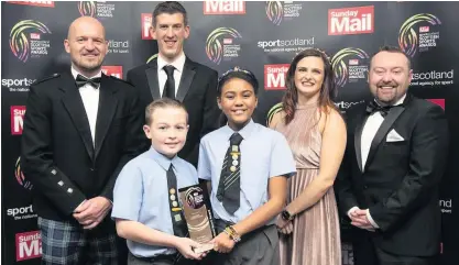  ??  ?? Great try Scottish Rugby Union coach Gregor Townsend (left) with the victorious St Brigid's team at the awards ceremony