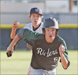  ??  ?? YUMA SHORTSTOP JAIDEN HADDOCK (left) chases Youngker’s Nathan Morgan during a rundown play between first and second base in the top of the fourth inning of Monday afternoon’s game at Doan Field. Irish take care of Ducks