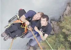  ??  ?? An episode featuring Rick Mercer and Canadian wheelchair athlete Rick Hansen bungee jumping in Whistler, B.C., aired in 2009.