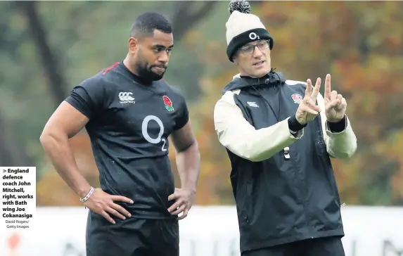 ?? David Rogers/ Getty Images ?? England defence coach John Mitchell, right, works with Bath wing Joe Cokanasiga