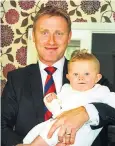  ??  ?? Rhian’s husband Paul holding son George – they died within five days of each other