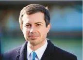  ?? MATT ROURKE/AP ?? Transporta­tion Secretary Pete Buttigieg kicked off his $1 billion road pilot program in Alabama.