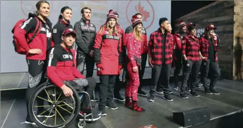  ?? ANDREW FRANCIS WALLACE, TORONTO STAR ?? Athletes unveil the Team Canada clothing line for the 2018 Pyeongchan­g Olympics at the Eaton Centre in Toronto.