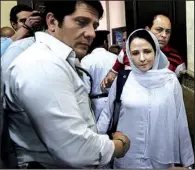  ?? AP/MOHAMED EL RAAI ?? Aya Hijazi, a dual U.S.-Egyptian citizen, leaves a Cairo courtroom after being cleared of charges connected to a foundation she helped to establish.