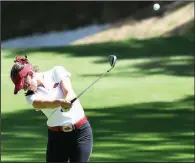  ?? NWA Democrat-Gazette/J.T. WAMPLER ?? ABOVE Kaylee Benton of Arkansas hits an approach shot on the ninth hole during the second round of the NCAA women’s golf championsh­ip Sunday at the Blessings Golf Club in Fayettevil­le. BELOW Brooke Matthews of Arkansas reacts after holing out a chip shot on the ninth hole.