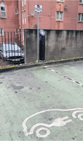  ??  ?? Show of power A vehicle recharging point at Muiryhall car park in Coatbridge