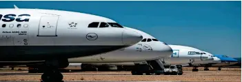  ?? — AFP ?? GROUNDED: The Middle East and African airlines will incur $6 billion additional losses in May.