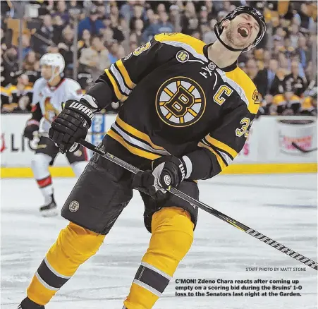  ?? STAFF PHOTO BY MATT STONE ?? C’MON! Zdeno Chara reacts after coming up empty on a scoring bid during the Bruins’ 1-0 loss to the Senators last night at the Garden.