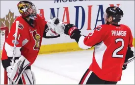  ?? The Canadian Press ?? Ottawa Senators goalie Craig Anderson and defenceman Dion Phaneuf celebrate after beating the Pittsburgh Penguins 2-1 on Tuesday in Game 6 of the NHL Eastern Conference final.The teams meet again tonight in Pittsburgh for Game 7.