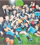  ?? Photo / John Stone ?? Northland players and coaches after thumping Central Vikings in Whanga¯rei in the 1997 final.