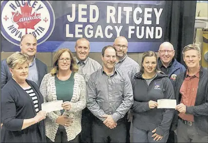  ?? SUBMITTED ?? On Monday, it was announced the Jed Ritcey Legacy Fund will disperse almost $20,000 to local minor hockey associatio­ns this season. Taking part in the presentati­on are, front row, from left, Betty Ritcey (Jed’s wife), Marilyn Hutchinson (Tatamagouc­he minor hockey), Josh Boulton (South Colchester minor hockey), Charlene Bagnell, (Colchester female hockey) and Matt Moore (board member); second row, Dave Ritcey (board member), Andrew St. Coeur (Truro minor hockey), Matthew White (South Colchester minor hockey) and Bob Taylor (board member).