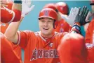  ?? TED S. WARREN/ASSOCIATED PRESS ?? Mike Trout and the rest of the Los Angeles Angels could stay at home in one plan that would realign divisions for the season.
