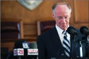  ??  ?? REMARKABLE FALL: Former Alabama Governor Robert Bentley speaks after officially resigning Monday in Montgomery, Ala. Bentley resigned rather than face impeachmen­t and pleaded guilty to two misdemeano­r campaign violations that arose during an...