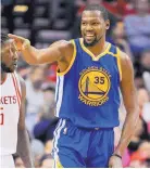  ?? ERIC CHRISTIAN SMITH/ASSOCIATED PRESS ?? Kevin Durant scored 32 points in the Warriors’ win over the Rockets Friday.