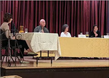  ?? JAKE HUTCHISON — ENTERPRISE-RECORD ?? Moderator Molly Paul appears on stage next to supervisor candidates Carl Jeffries, Debra Lucero and Tami Ritter on Thursday at the Chico Women’s Club in Chico for an open forum on law enforcemen­t issues.