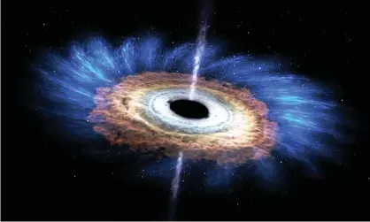  ??  ?? An artist’s impression of a star being torn apart by a black hole. Photograph: Nasa's Goddard Space Flight Center