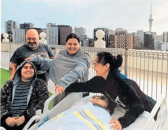  ?? ?? Louis and Janelle Ta¯ tana with their three children, Royden, 18, Makena-May 13, and Billy 15, when dad and siblings came to visit Mum and Billy at Auckland Starship Children's Hospital.