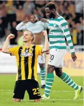  ?? Picture: REUTERS ?? SUCH A GREAT FEELING: AEK Athens' Niklas Hult celebrates as Celtic's Moussa Dembele looks dejected.