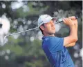  ?? SETH WENIG/ASSOCIATED PRESS ?? Robert Streb watches his tee shot on the eighth hole Friday. He became the 28th player with a 63 in a major.