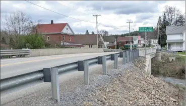  ?? Photo submitted ?? The bridge spanning Canoe Creek on Route 36 in the Cloe area has been officially designated the Larry E. Frantz Memorial Bridge.