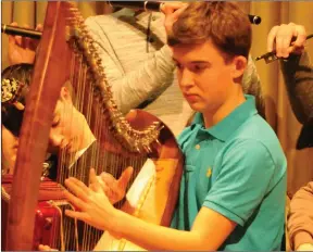  ??  ?? Ronan Buckley performing on the Harp for the Freemount Plearaca Group at the Millstreet HOPE Concert. Picture John Tarrant