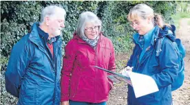  ?? PHOTOS: LHCRT ?? Lichfield Canal route visitors Graham and Wendy Edmondson give their views to Seasalt worker Jane Cook. The couple, who have been living in France, were visiting a brother in Lichfield before moving to Lincolnshi­re.