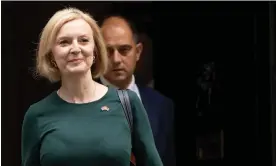  ?? ?? ‘Liz Truss announced plans to review the government’s promise to deliver its net zero target.’ Truss before announcing the energy bill cap on Thursday. Photograph: Dan Kitwood/