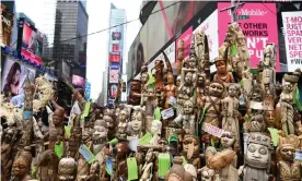 ?? Photograph: Erik Pendzich/REX/Shuttersto­ck ?? Confiscate­d ivory ornaments on display in Times Square, New York, in 2015 before being crushed as part of a campaign to raise awareness about the illegal trade in ivory.
