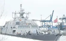  ?? GRAHAM HUGHES/THE CANADIAN PRESS ?? The USS Little Rock is shown moored in Montreal’s old port, Sunday. The newly commission­ed Navy warship will be wintering in Montreal after its journey to Florida was interrupte­d by cold and ice.