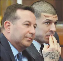  ?? STAFF PHOTO BY CHRIS CHRISTO ?? CLOSER: Lead defense attorney Jose Baez, left, and Aaron Hernandez listen to Judge Jeffrey A. Locke during motion hearings yesterday.