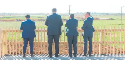  ?? Photos / Danielle Zollickhof­er ?? Hamilton West MP Dr Gaurav Sharma, Tainui Group Holdings CEO Chris Joblin, Minister of Transport Michael Wood and Hamilton East MP Jamie Strange checking out the mahi at the site of the future Ruakura Superhub.