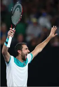  ?? CLIVE BRUNSKILL, GETTY IMAGES ?? Marin Cilic celebrates match point in his Australian Open semifinal win over Kyle Edmund. Cilic won, 6-2, 7-6 (4), 6-2.