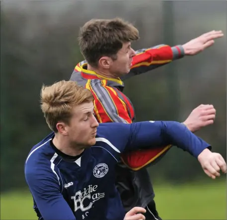  ?? Pic: Carl Brennan. ?? Calry’s Conor Griffin in action with Ronan O’Grady Glenview Stars.
