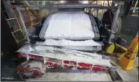  ?? (File Photo/AP/Las Vegas Sun/Steve Marcus) ?? Technical-grade lithium carbonate comes off a conveyor belt Jan. 30, 2017, during a tour of the Silver Peak lithium mine near Tonopah, Nev.