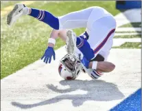  ?? ADRIAN KRAUS - THE ASSOCIATED PRESS ?? Buffalo Bills tight end Dawson Knox (88)catches a touchdown pass to score during the first half of an NFL football game against the Los Angeles Chargers, Sunday, Nov. 29, 2020, in Orchard Park, N.Y.